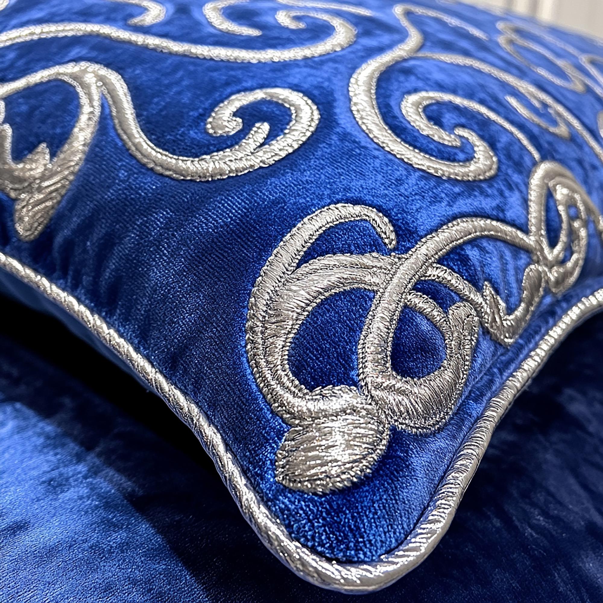 Close-up of blue embroidered badge on fabric